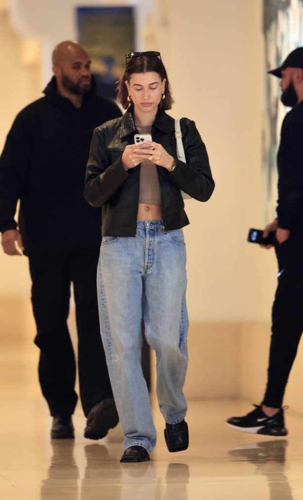 Hailey Bieber - Out in blue jeans and a crop top in Beverly Hills
