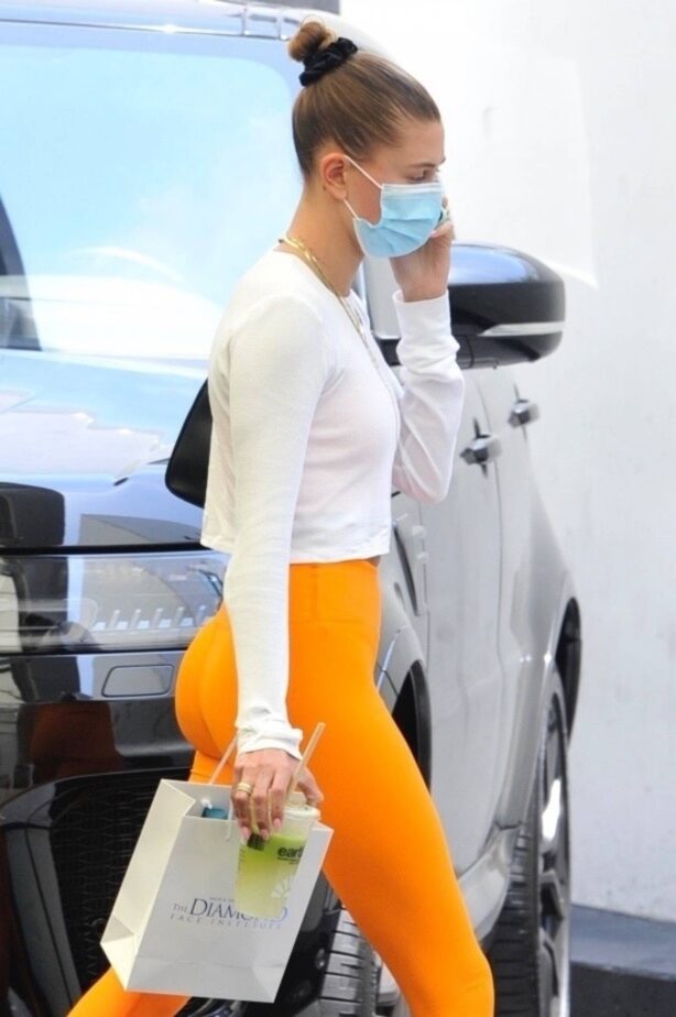 Hailey Bieber - Out in Orange leggings in Beverly Hills