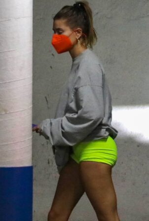 Hailey Bieber - Wearing neon workout shorts in Los Angeles