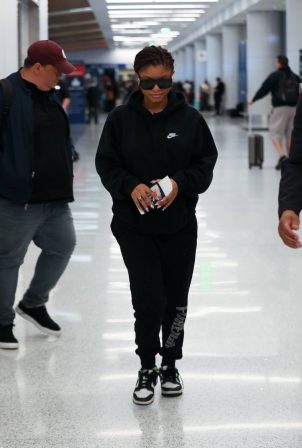 Halle Bailey - Arrives at the airport in Los Angeles