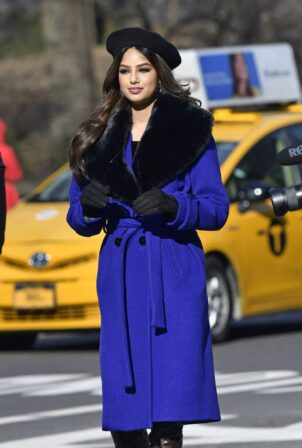 Harnaaz Sandhu - Wearing a fur accented purple coat on a press photo op in New York