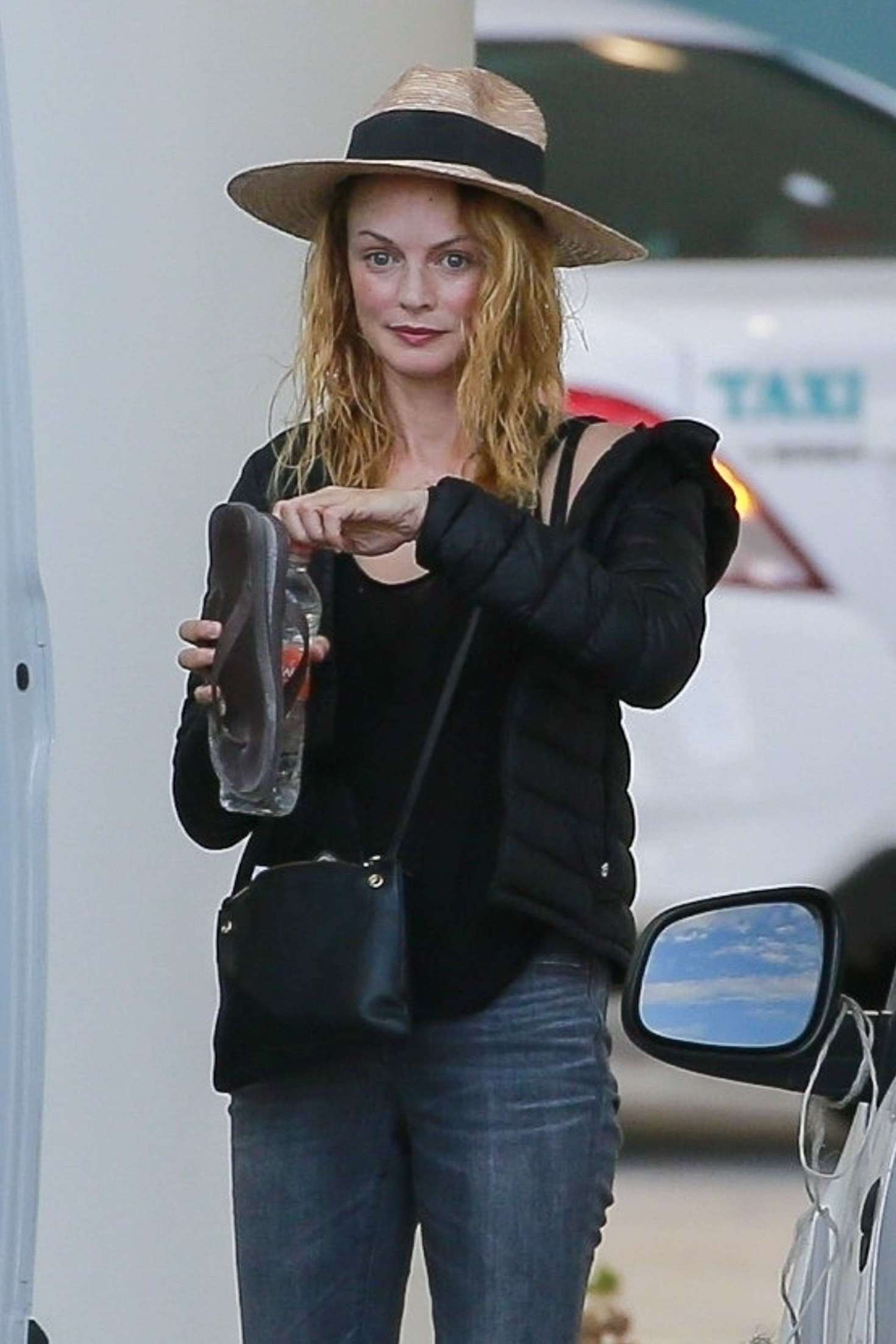 Heather Graham - Arrives at Cancun International Airport in Mexico