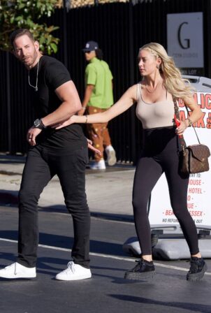 Heather Rae El Moussa - Holds hands with Tarek El Mousa as they arrive at Tao in Los Angeles