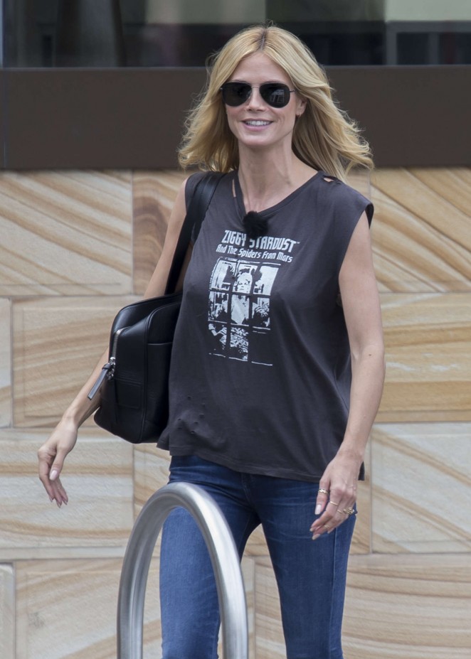 Heidi Klum in Jeans Boards a boat in Sydney Harbour