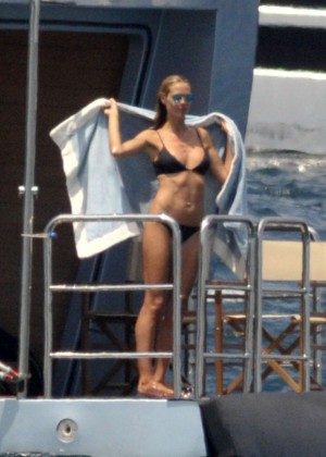 Heidi Klum in Black Bikini in the Mediterranean