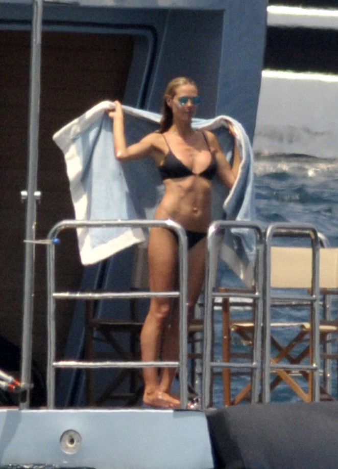 Heidi Klum in Black Bikini in the Mediterranean