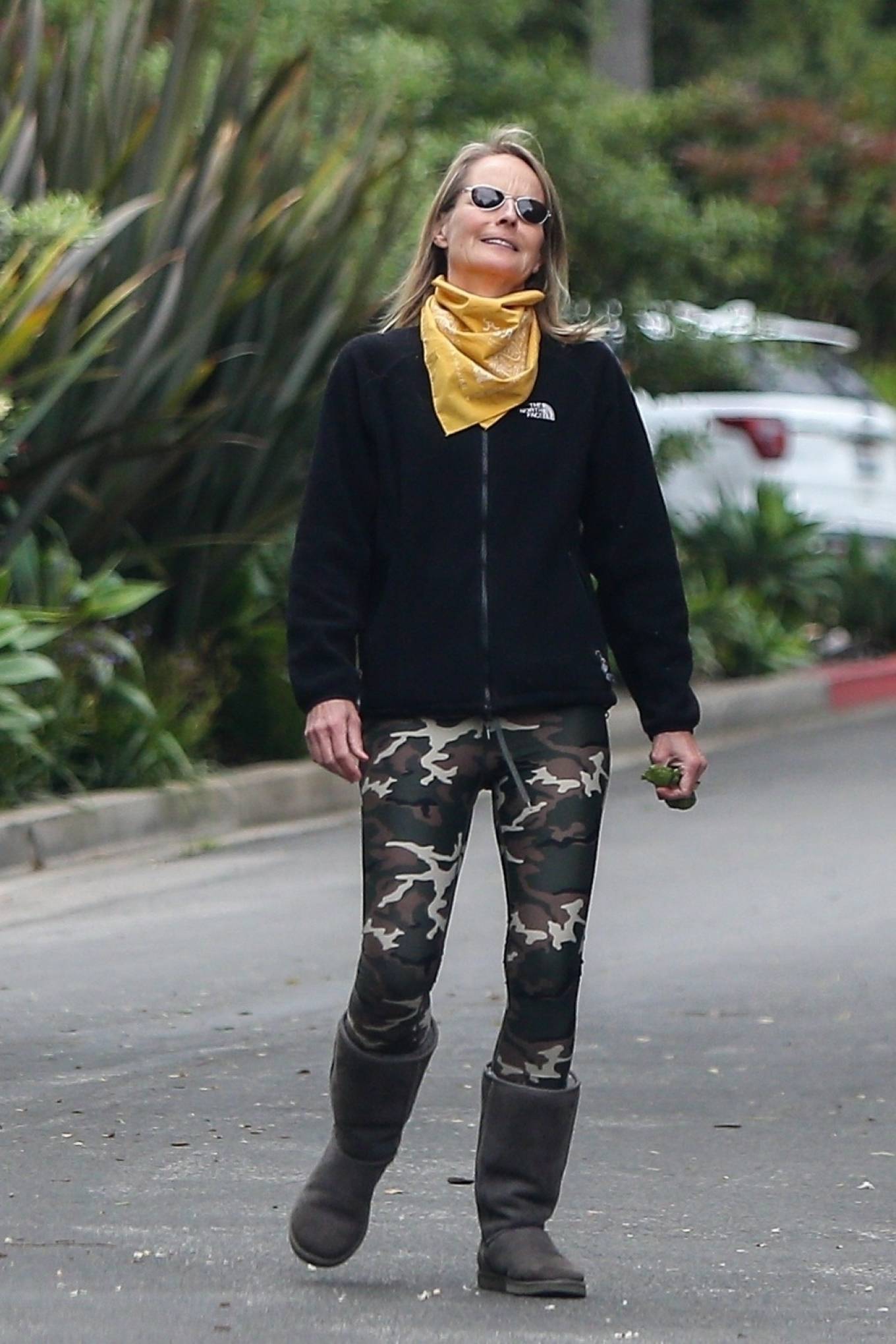 Helen Hunt â€“ Goes out for a walk in a military leggings