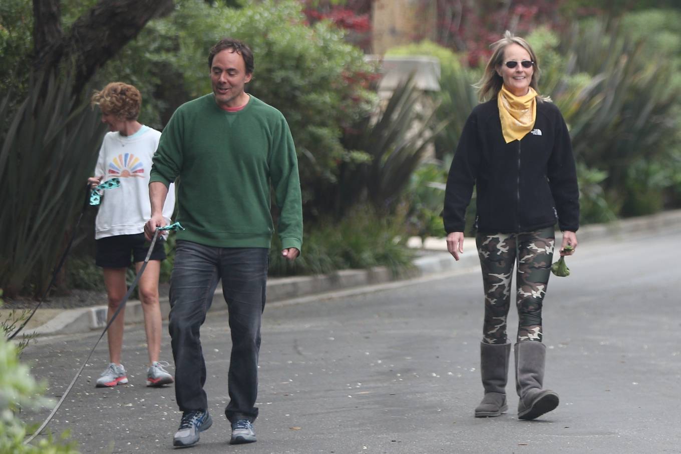 Helen Hunt â€“ Goes out for a walk in a military leggings