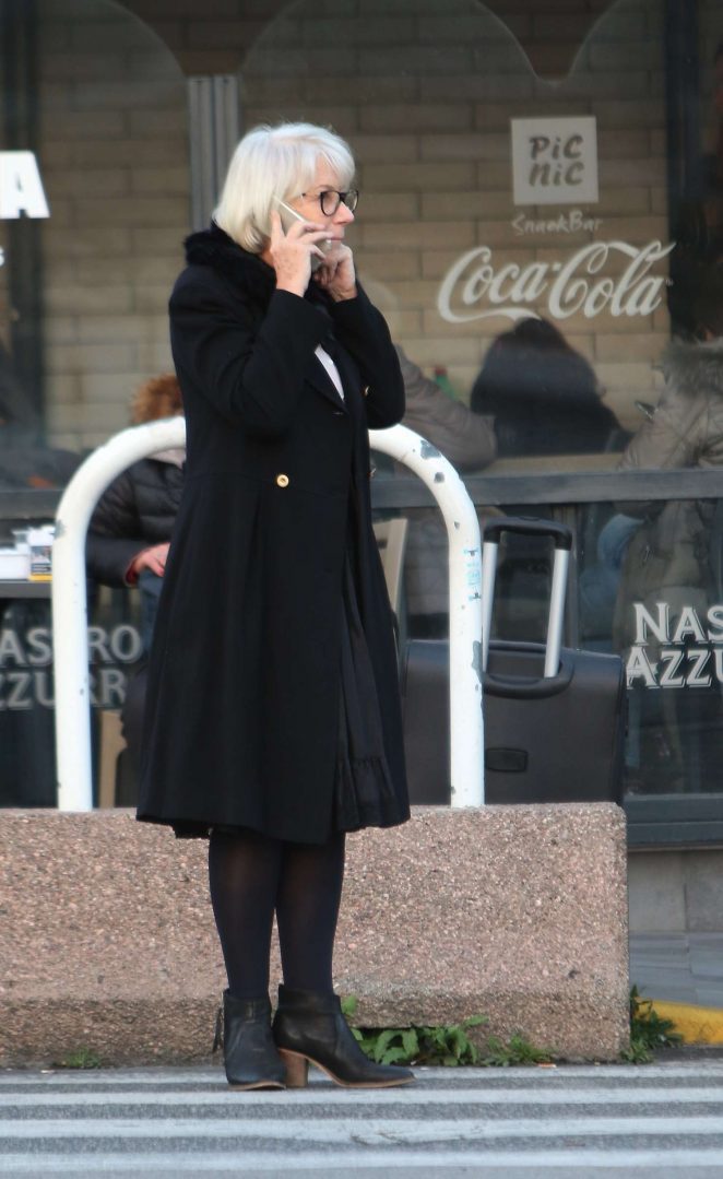 Helen Mirren in Black Coat Arrives in Naples