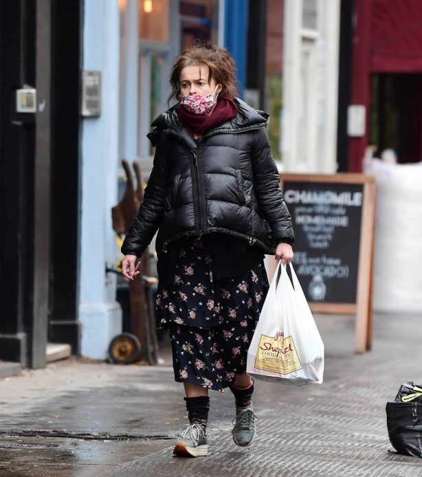 Helena Bonham Carter - In a puffer jacket and floral dress running errands in North London