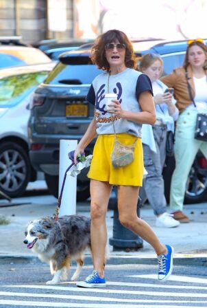 Helena Christensen - Steps out with her dog in New York