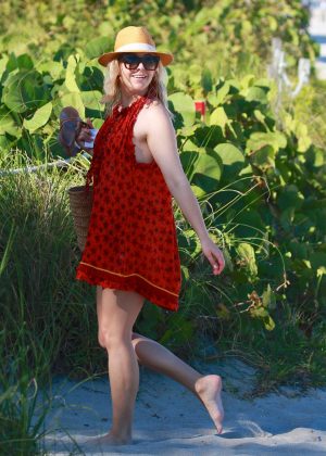 Helene Yorke in Red Dress spends her birthday on a Miami Beach