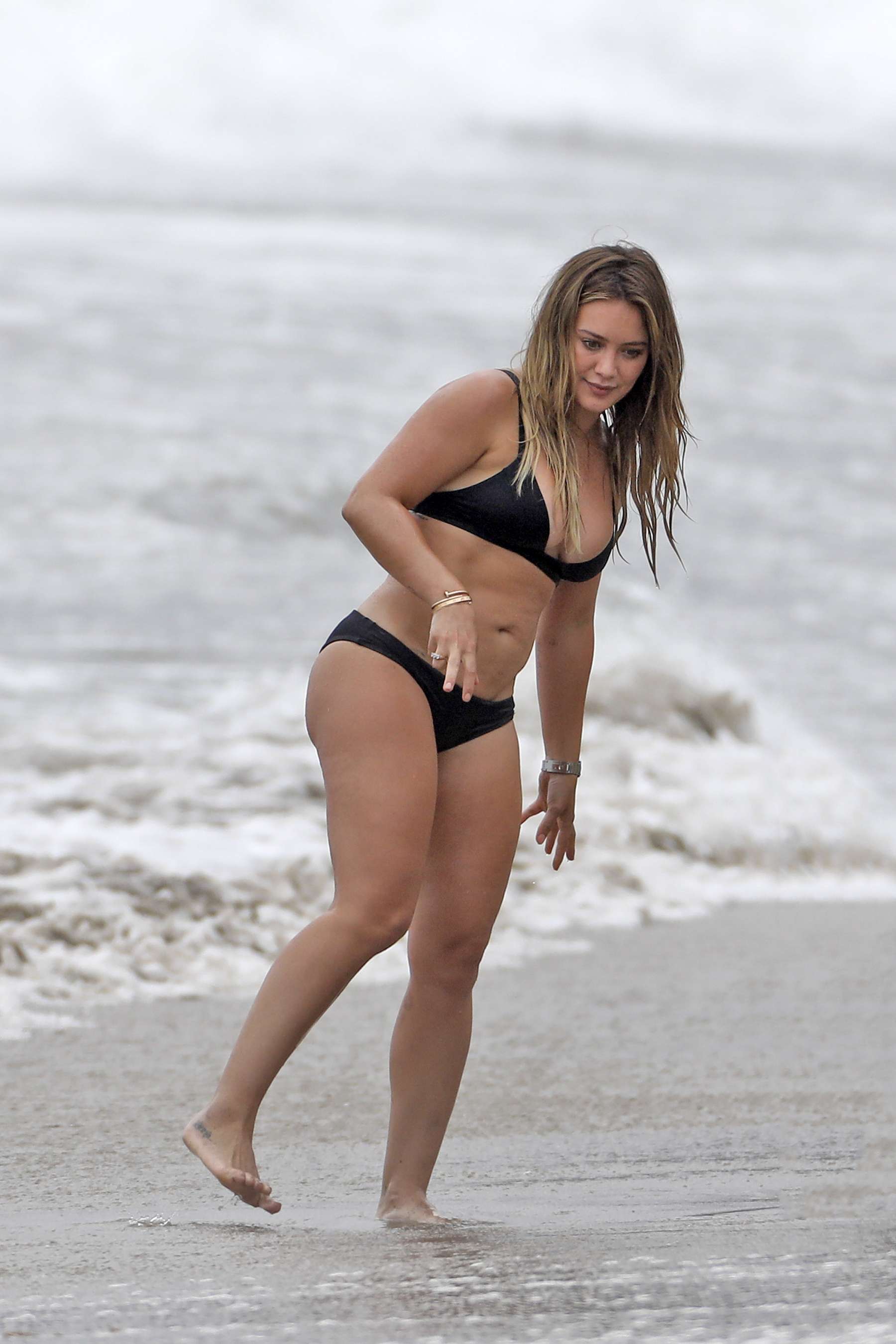 Hilary Duff - Bikini at a beach in Malibu 2017. 