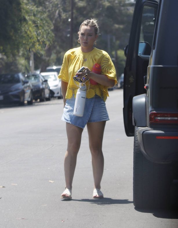 Hilary Duff - In a denim skirt and Chloe sandals in Los Angeles