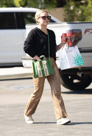 Hilary Duff - In a snakeskin pants running errands in Studio City