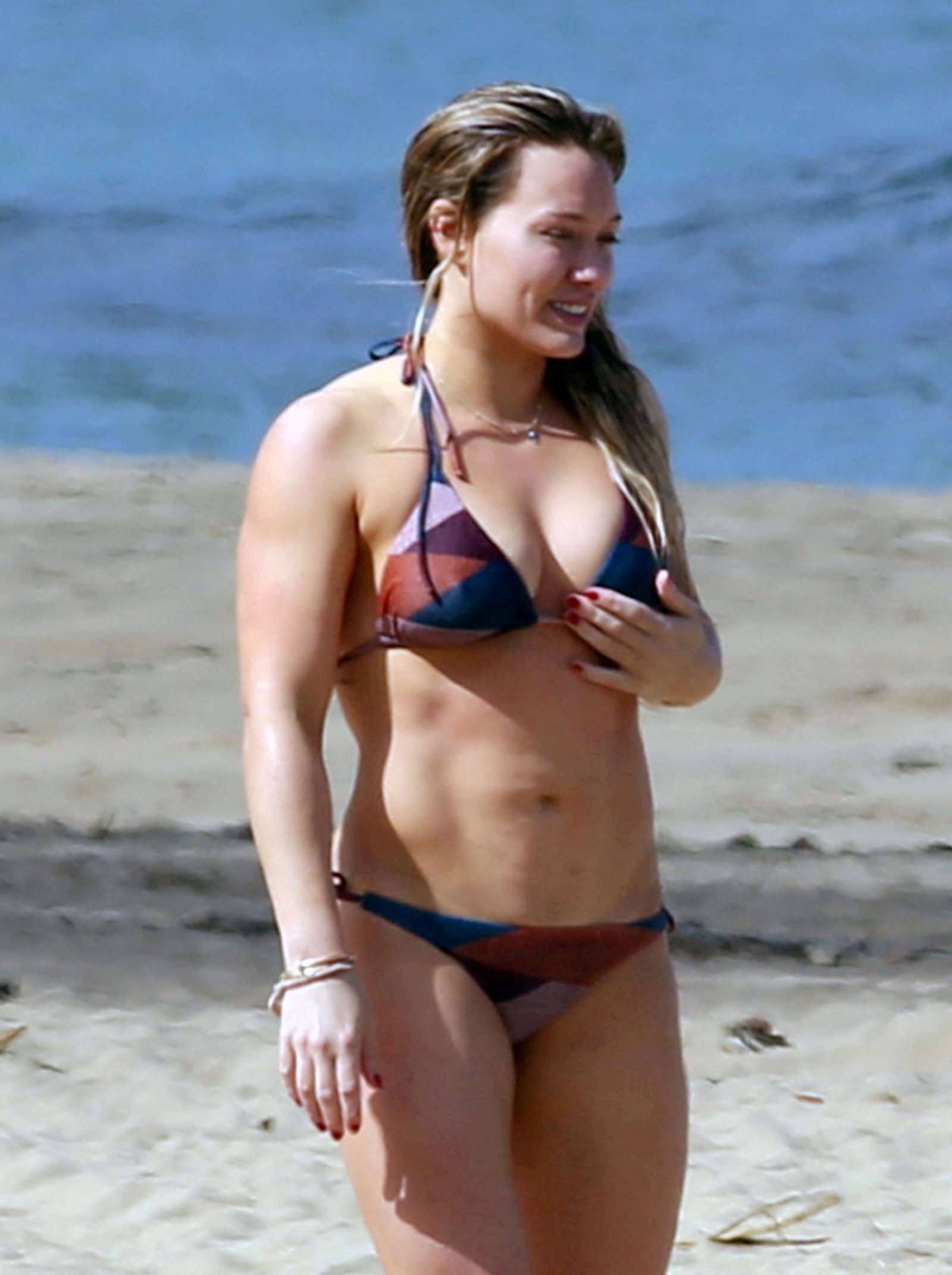 Hilary Duff in Bikini Bottoms Surfing in Hawaii. 