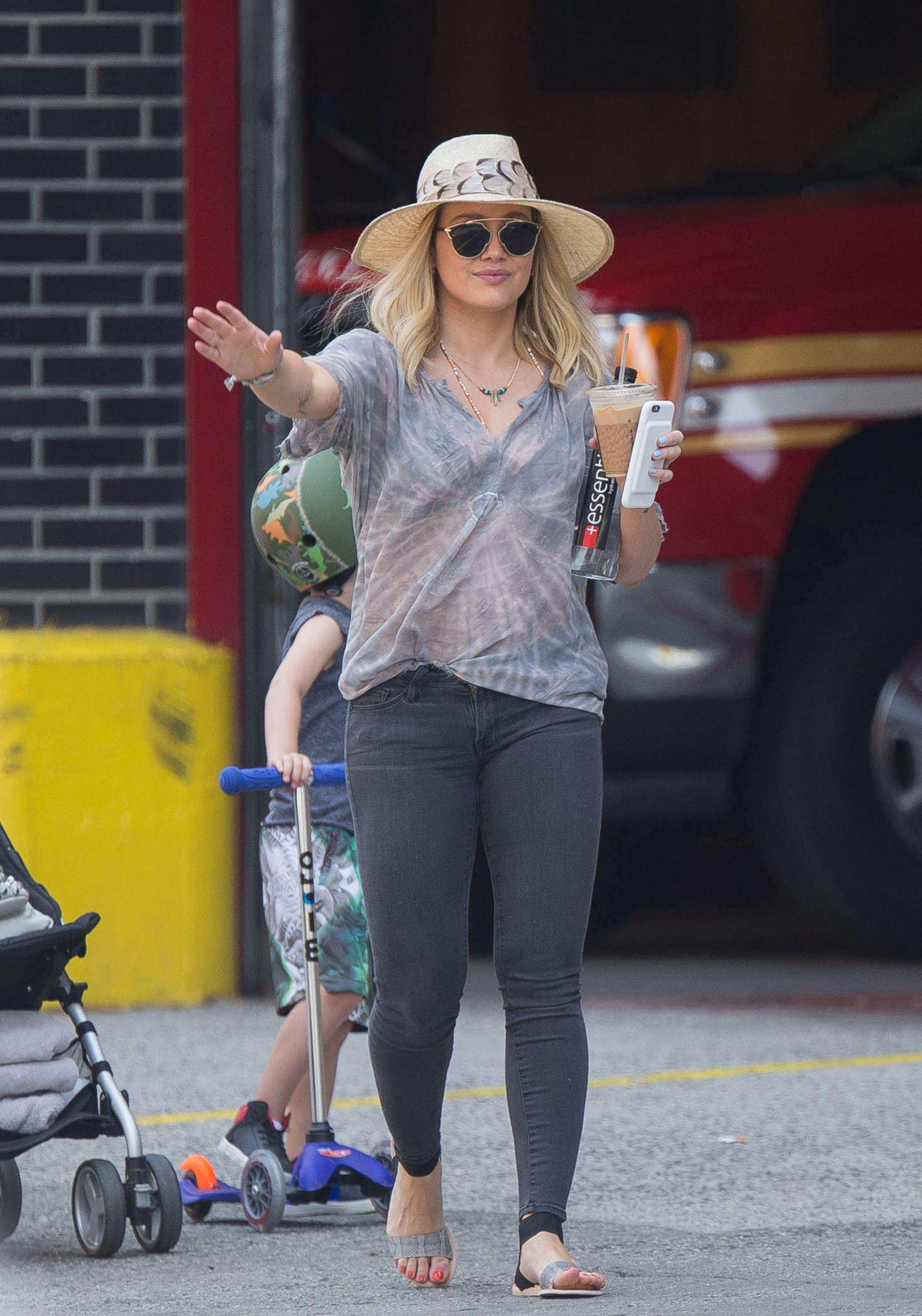 Hilary Duff in Jeans hail a cab in New York City