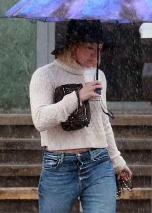 Hilary Duff in Jeans out on a rainy day in Los Angeles