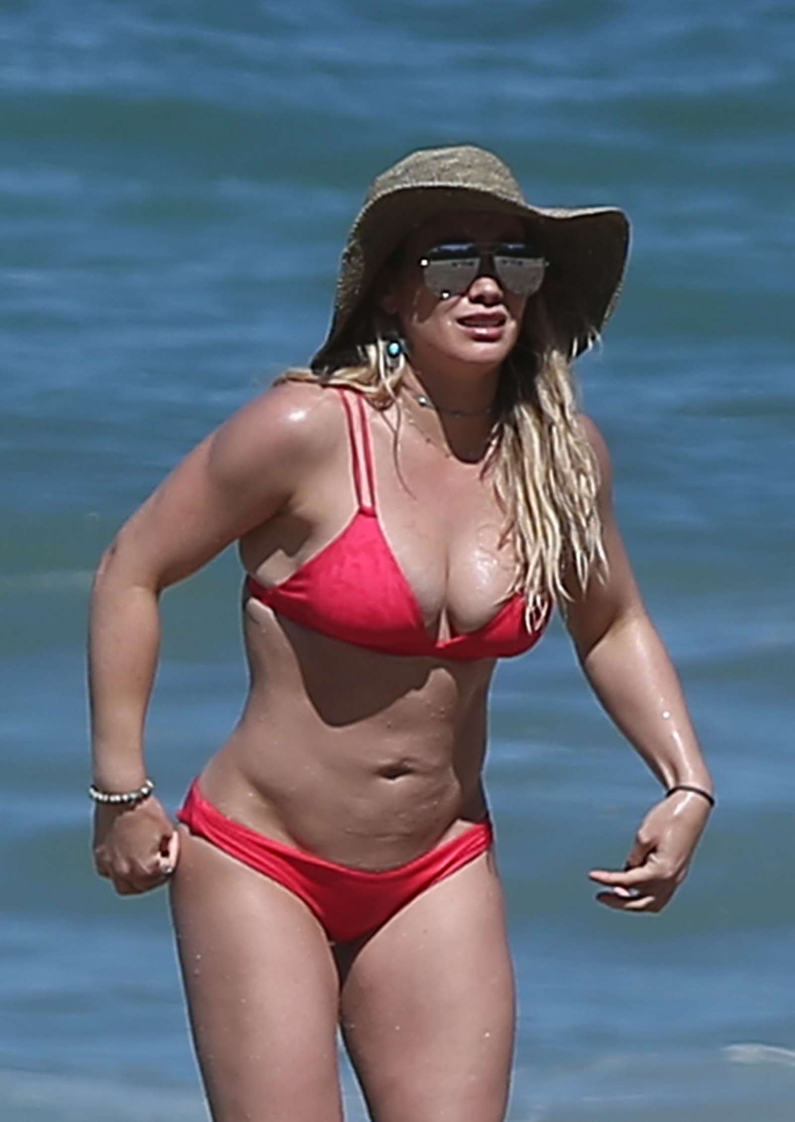 Hilary Duff in Red Bikini on the beach in Mexico. 