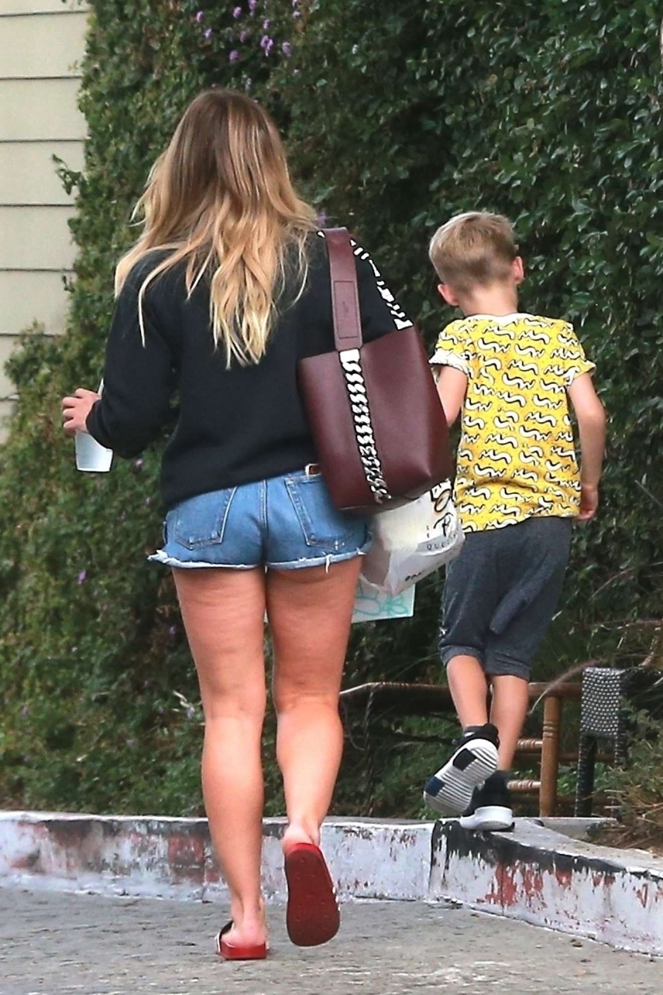 Hilary Duff - Leggy in shorts out in Studio City. 