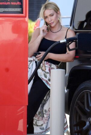Hilary Duff - pumping gas into her Matte Black Gwagon on her 35th birthday in LA