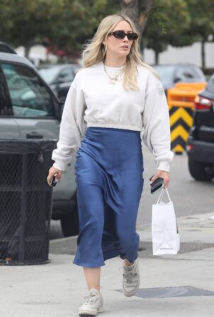 Hilary Duff - Rocks in satin blue skirt as seen at Joan's On Third