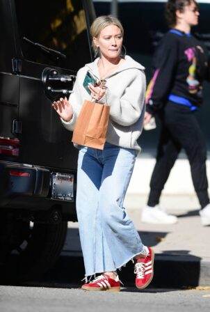 Hilary Duff - Seen in a red Adidas sneakers while out in Los Angeles