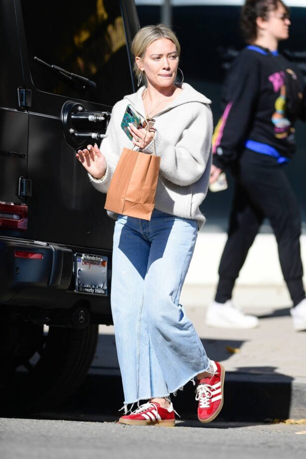 Hilary Duff - Seen in a red Adidas sneakers while out in Los Angeles