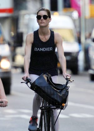 Hilary Rhoda rides her bike in New York City