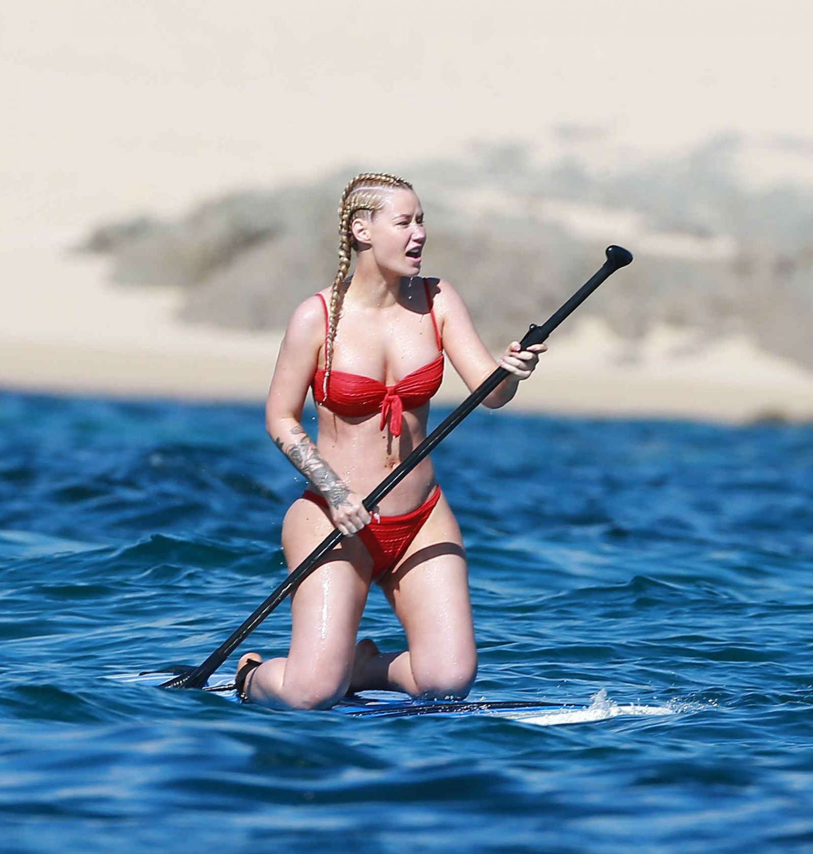 Iggy Azalea in Red Bikini on a yacht in Cabo San Lucas. 