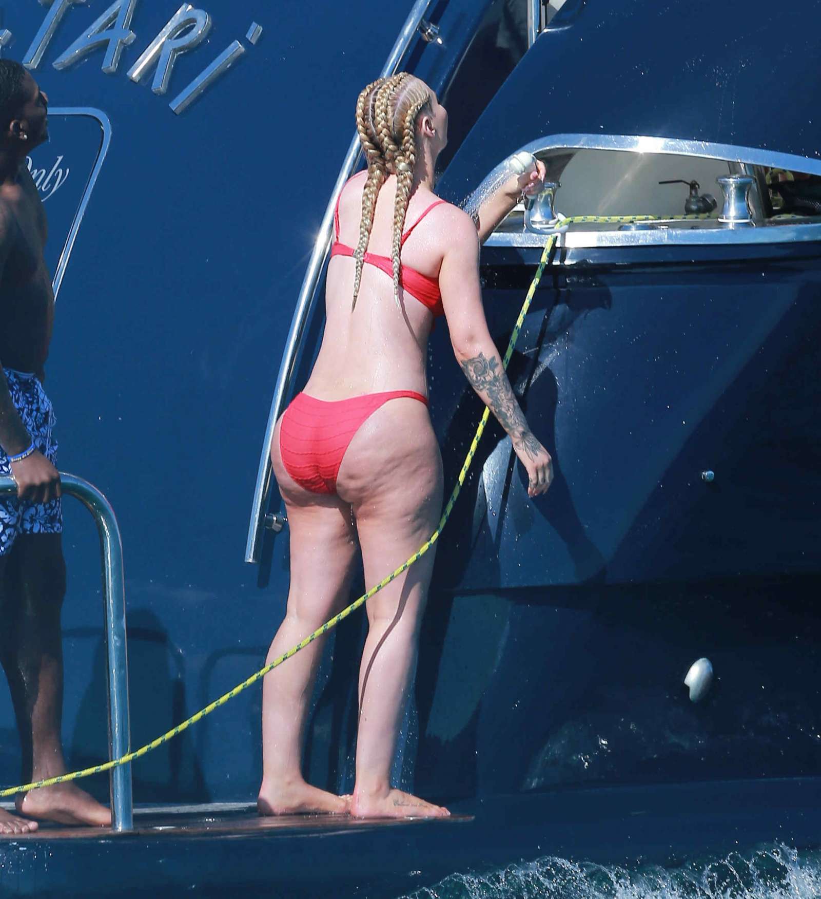 Iggy Azalea in Red Bikini on a yacht in Cabo San Lucas. 