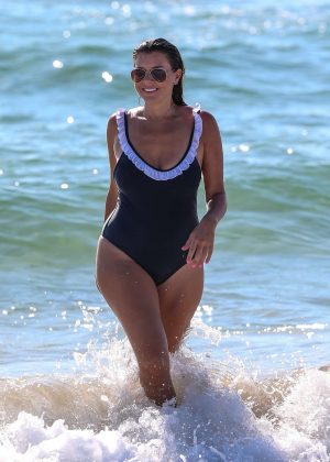 Imogen Thomas in Blue Swimsuit on the beach in Miami