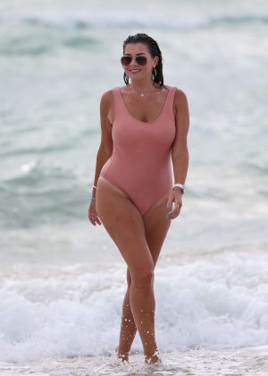 Imogen Thomas in Nude Swimsuit at the beach in Miami