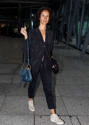 Indira Varma Arrives at Heathrow Airport in London