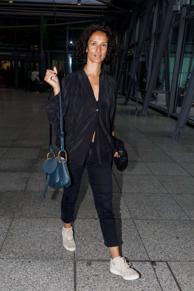Indira Varma Arrives at Heathrow Airport in London