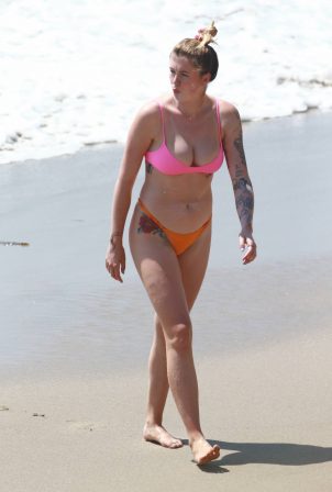 Ireland Baldwin - In a bikini with her boyfriend Corey Harper at the beach in Malibu