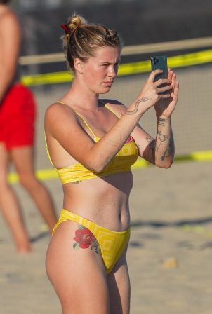 Ireland Baldwin - In a yellow bikini on the beach in Malibu