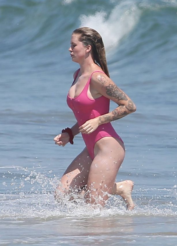 Ireland Baldwin - In Pink Swimsuit at the beach in Malibu