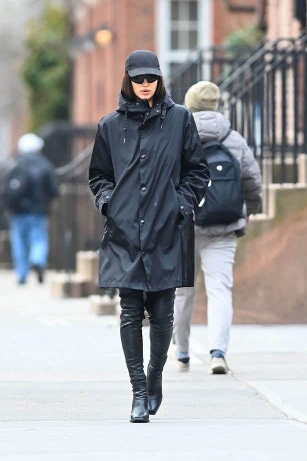 Irina Shayk - Displays a stain on her Versace coat in New York