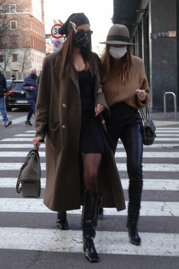 Irina Shayk - In a Versace getup as she walks with her friend Valentina Michetti in Milan