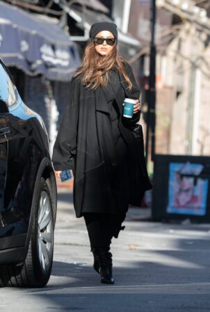 Irina Shayk - In all blacks for a walk in snowy New York