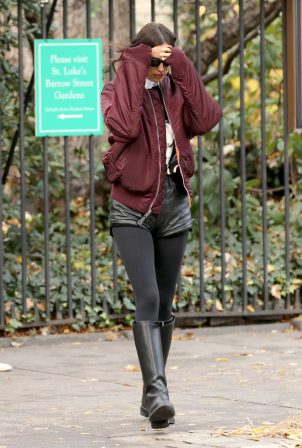 Irina Shayk - Wears black leather pants and black stockings while out in New York