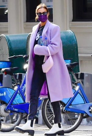 Irina Shayk - Wore a GCDS lilac trench coat in New York