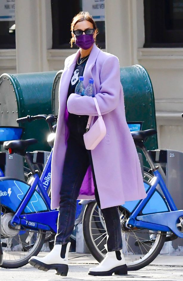 Irina Shayk - Wore a GCDS lilac trench coat in New York