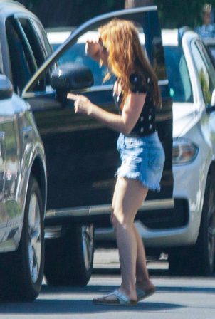 Isla Fisher in Jeans Shorts - Out in Los Angeles