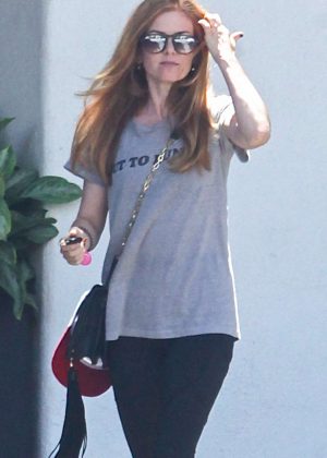 Isla Fisher in Tights Leaving the salon in Beverly Hills