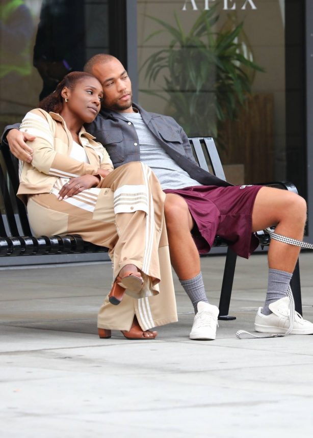 Issa Rae - With Kendrick Sampson filming 'Insecure' on a city bench in Los Angeles