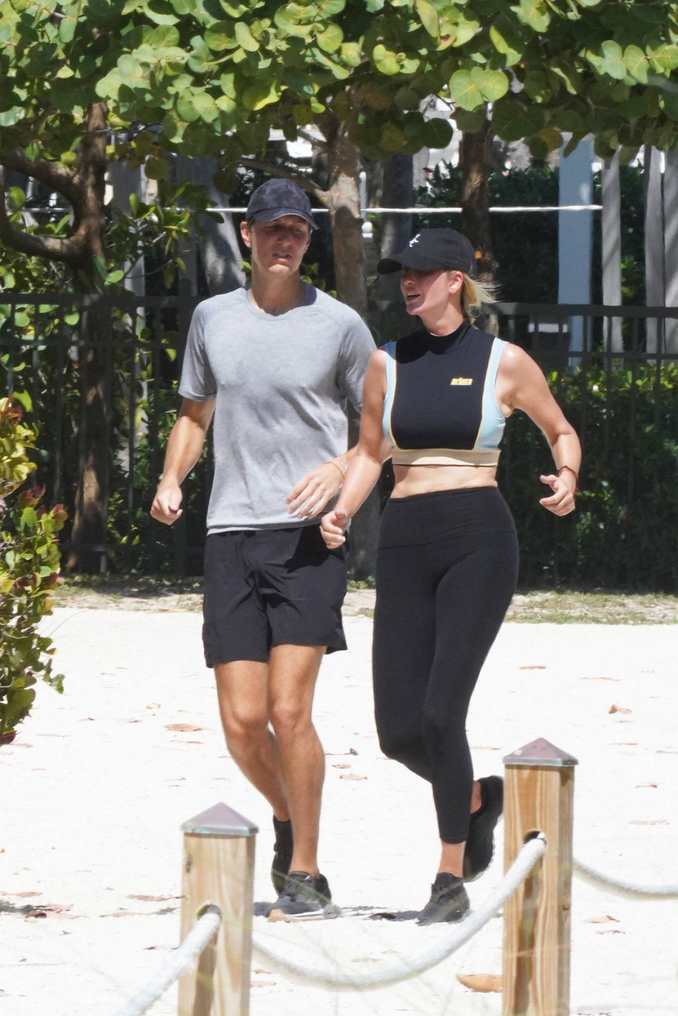 Ivanka Trump - With husband Jared Kushner on a beach jog in Miami
