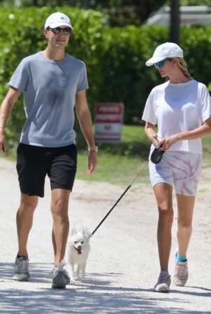 Ivanka Trump - With husband Jared Kushner on a stroll with their dog in South Beach
