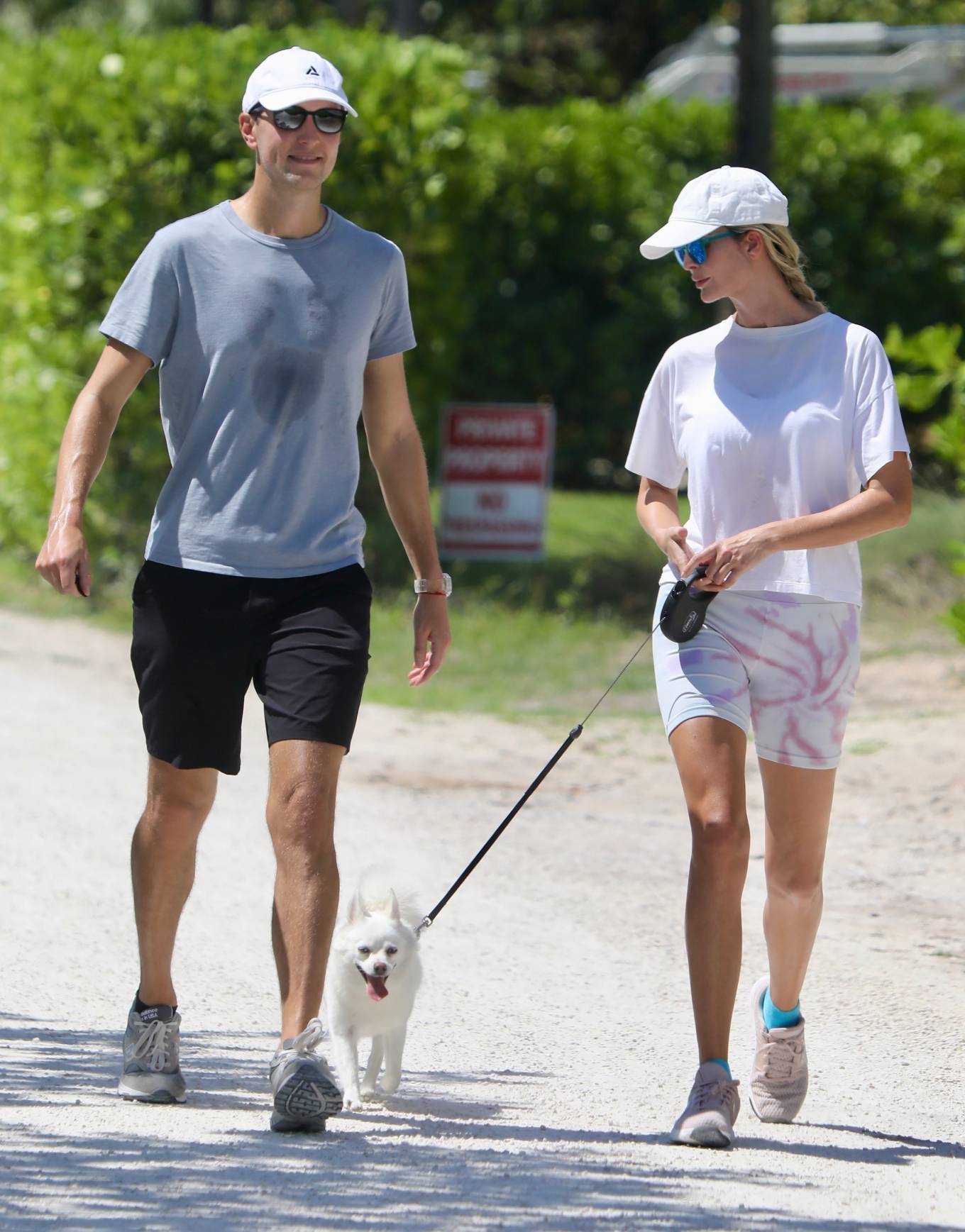 Ivanka Trump - With husband Jared Kushner on a stroll with their dog in South Beach